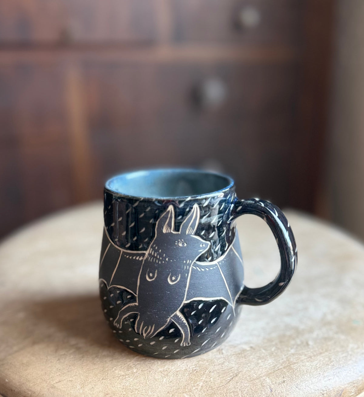 Black on black boobie bat mug