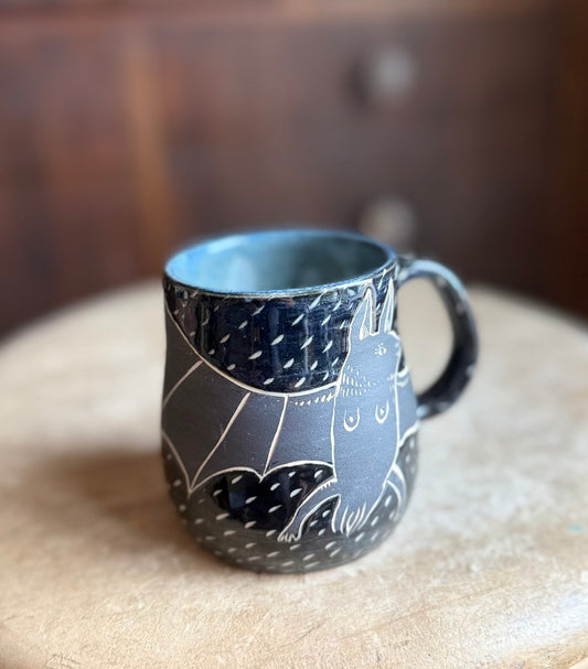 Black on black boobie bat mug