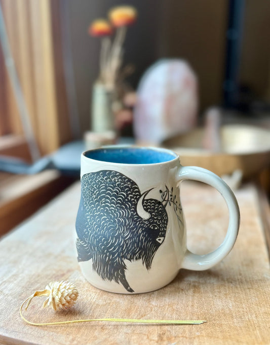 Bison with forget me nots mug