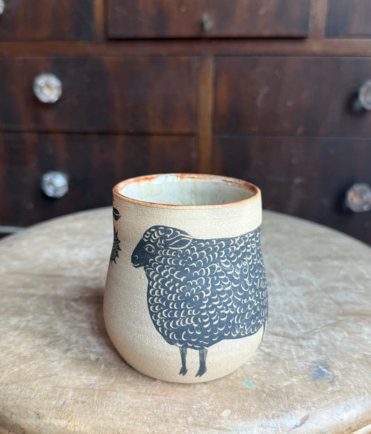 Sheep with sunflower