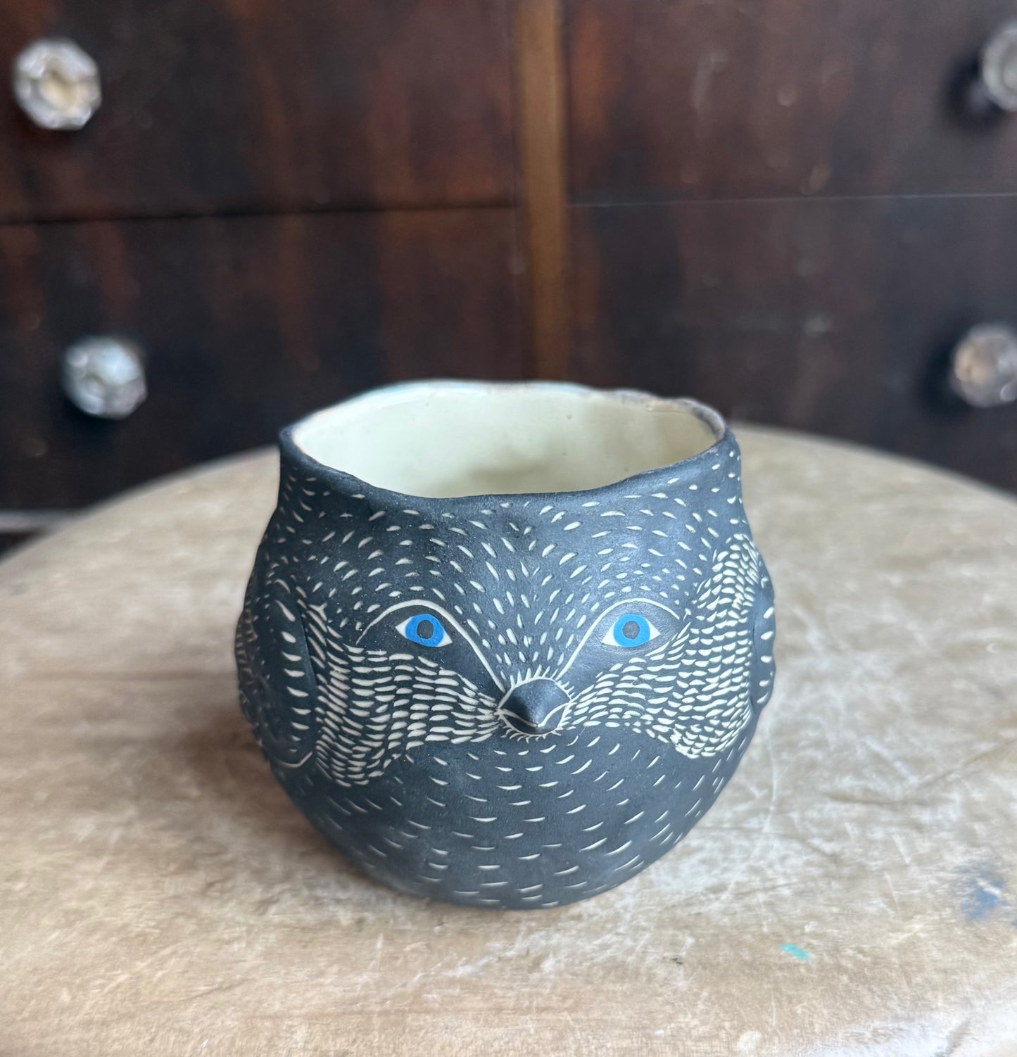 Bird in the hand sculpture  mug