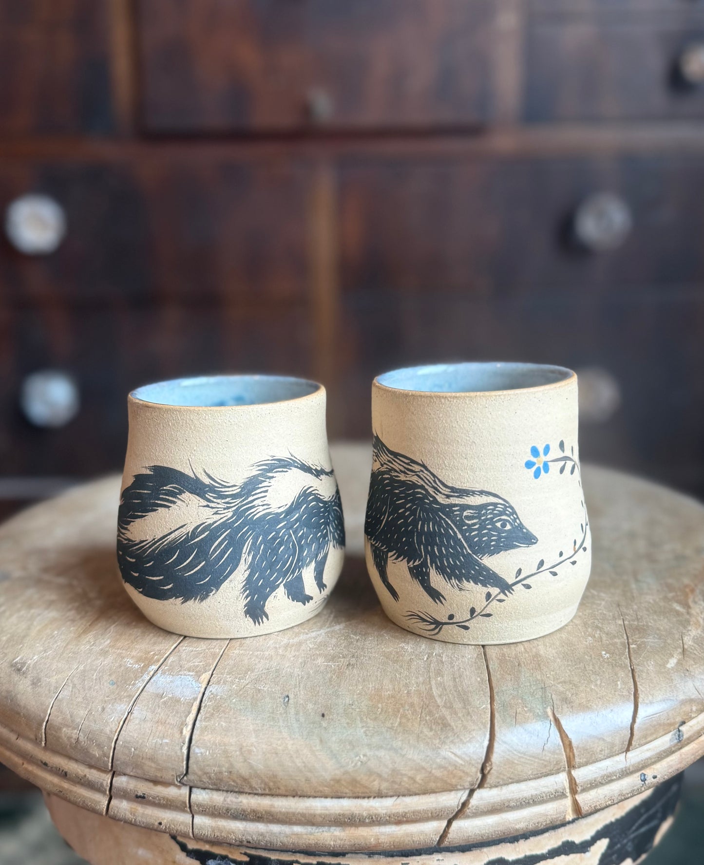 Pair of skunks cup set
